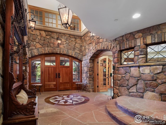 entryway featuring french doors