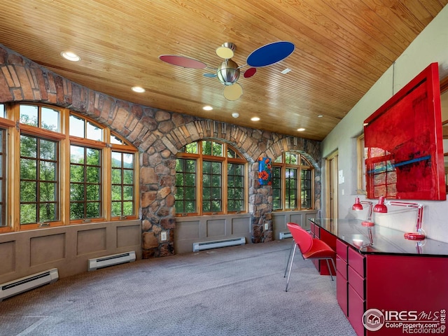interior space featuring ceiling fan, a baseboard radiator, and wood ceiling