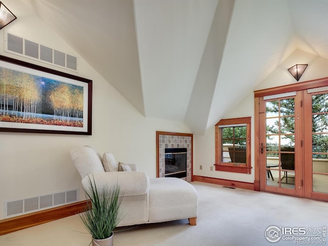 sitting room featuring carpet floors and a fireplace