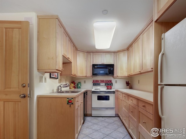 kitchen featuring light brown cabinetry, sink, light tile patterned floors, and black appliances
