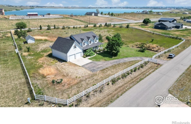 aerial view featuring a water view and a rural view