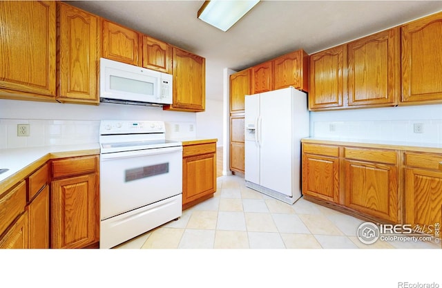 kitchen with white appliances