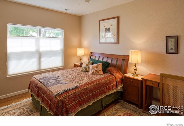 bedroom featuring light wood-type flooring