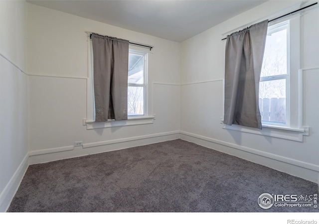 view of carpeted spare room