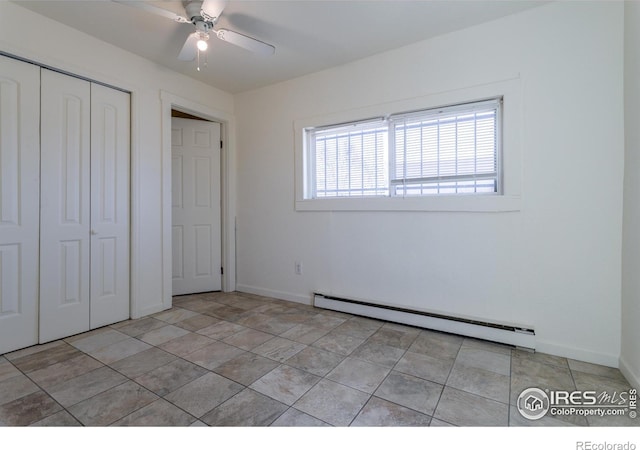 unfurnished bedroom featuring ceiling fan, a closet, and a baseboard radiator