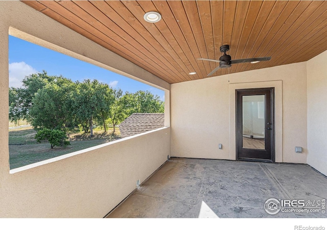 balcony featuring ceiling fan