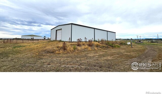 view of outbuilding featuring a garage