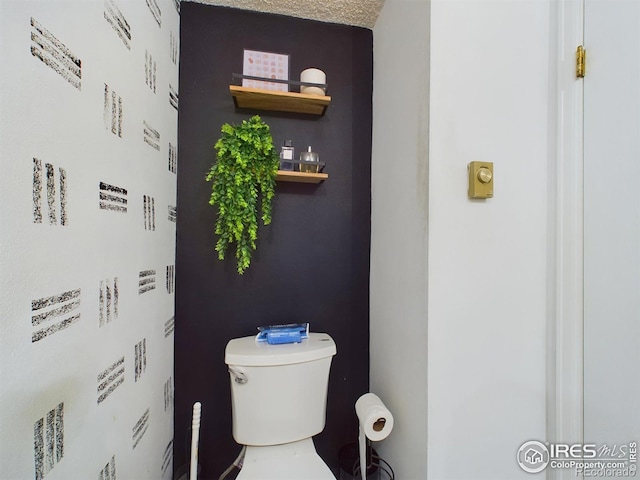 bathroom featuring toilet