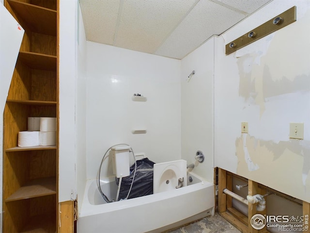 bathroom featuring shower / bath combination and a paneled ceiling