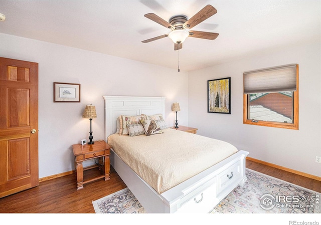 bedroom featuring hardwood / wood-style floors and ceiling fan