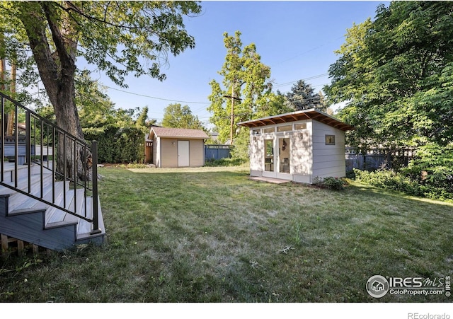 view of yard with a shed