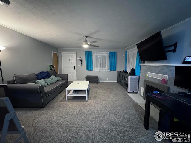 living area with ceiling fan and carpet flooring