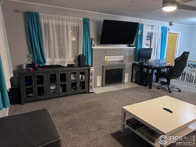 carpeted living area with a fireplace