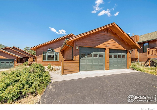 view of front of property featuring a garage