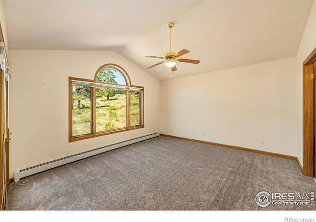 carpeted empty room with vaulted ceiling, baseboard heating, and ceiling fan