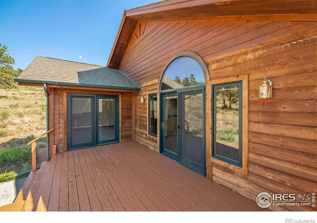 wooden deck with french doors