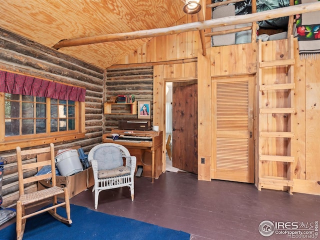 living area featuring rustic walls, dark wood-type flooring, wooden ceiling, wood walls, and vaulted ceiling