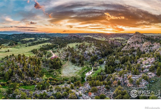 aerial view at dusk with a mountain view