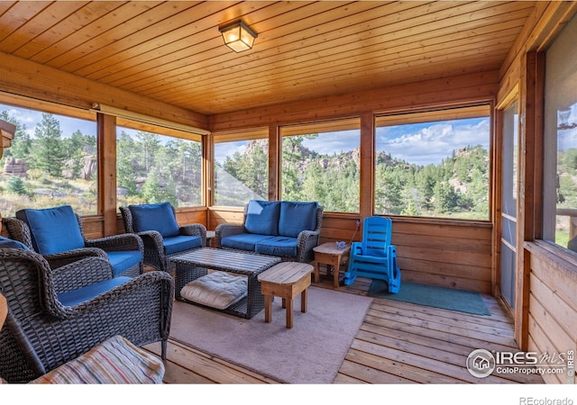 sunroom with wooden ceiling