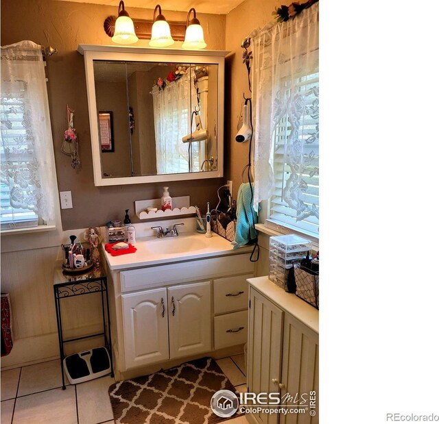 bathroom featuring vanity and tile patterned floors