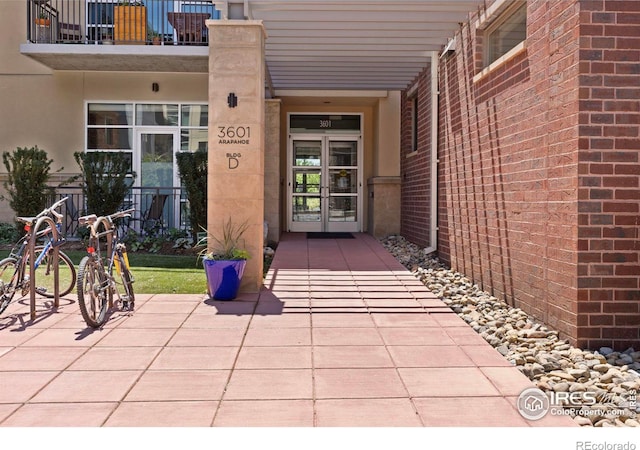 property entrance with a balcony