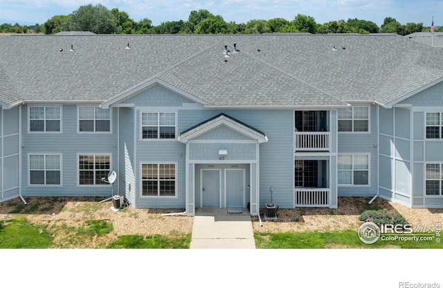 2990 W C St Unit 103, Greeley, CO 80631 - view of front of house featuring a shingled roof