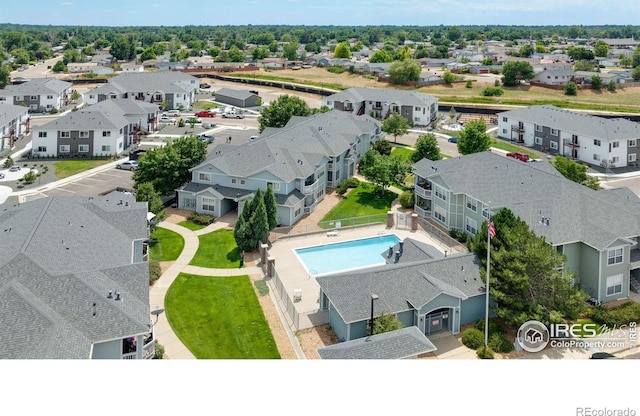 2990 W C St Unit 103, Greeley, CO 80631 - aerial perspective of suburban area with a pool