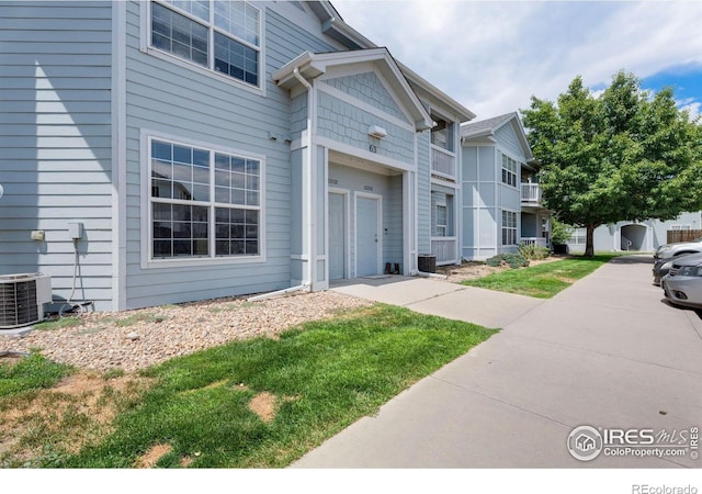 2990 W C St Unit 103, Greeley, CO 80631 - view of exterior entry with central AC unit