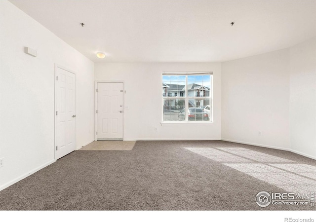 2990 W C St Unit 103, Greeley, CO 80631 - carpeted empty room featuring baseboards