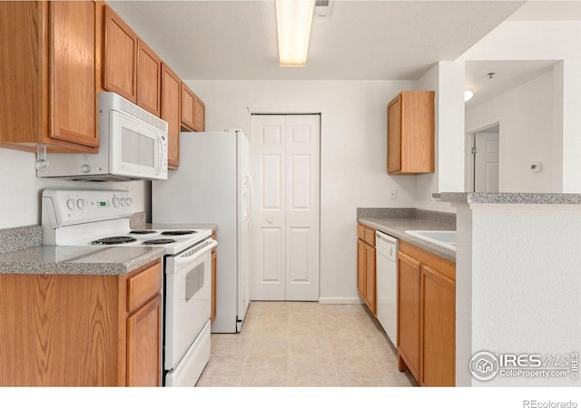 2990 W C St Unit 103, Greeley, CO 80631 - kitchen with white appliances