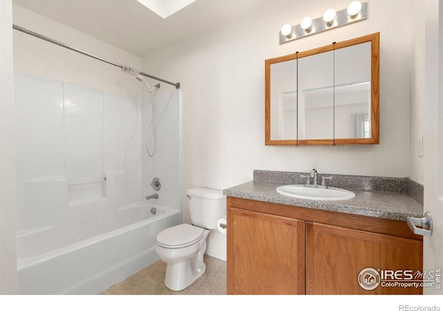 2990 W C St Unit 103, Greeley, CO 80631 - bathroom with toilet, vanity, bathtub / shower combination, and tile patterned floors