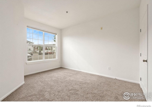 2990 W C St Unit 103, Greeley, CO 80631 - unfurnished room with carpet flooring and baseboards