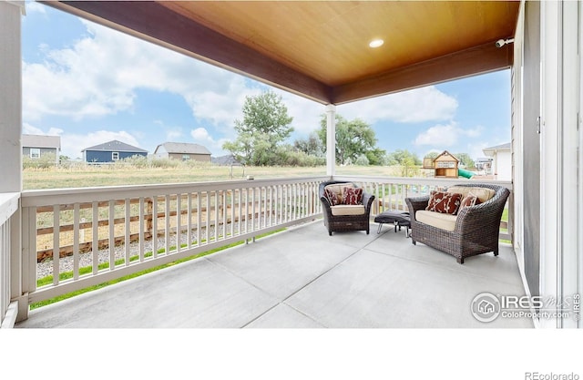 view of patio featuring a playground