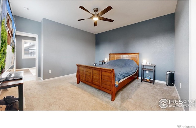 bedroom with light colored carpet and ceiling fan