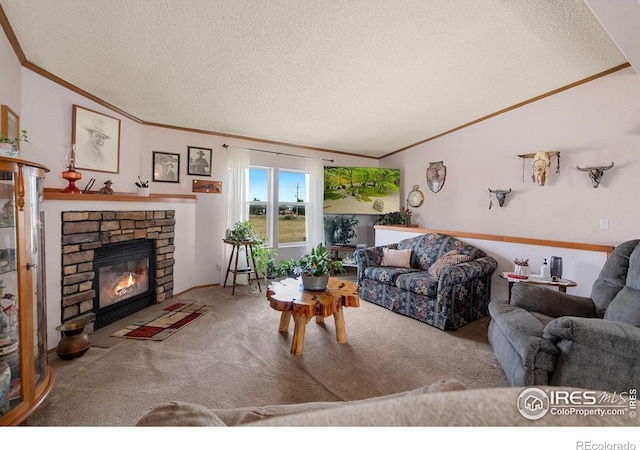 living room with lofted ceiling, a textured ceiling, carpet floors, and a stone fireplace