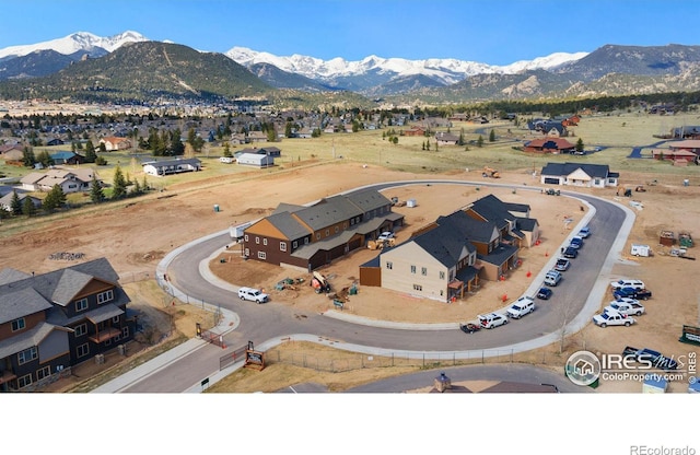 drone / aerial view featuring a mountain view