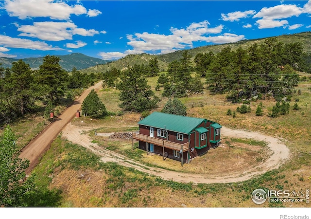 drone / aerial view featuring a mountain view