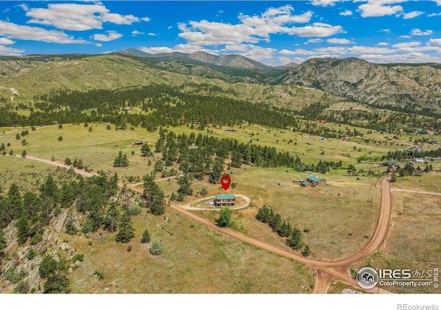 bird's eye view featuring a mountain view and a rural view