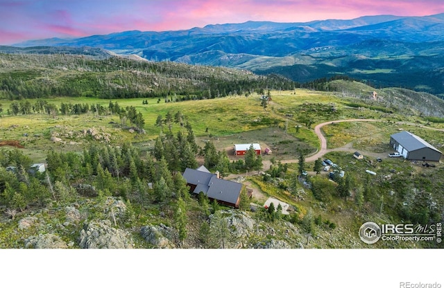 aerial view at dusk with a mountain view