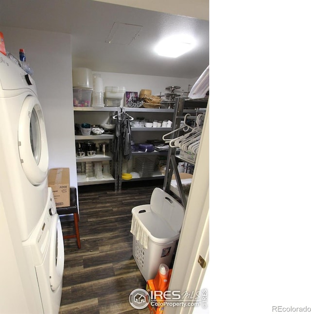 interior space with stacked washer / dryer