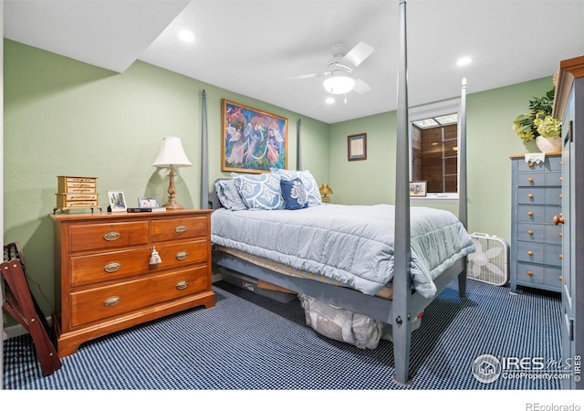 carpeted bedroom with ceiling fan