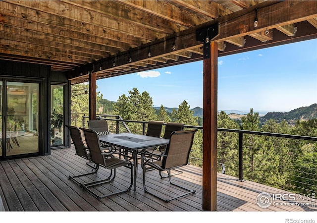 wooden terrace featuring a mountain view