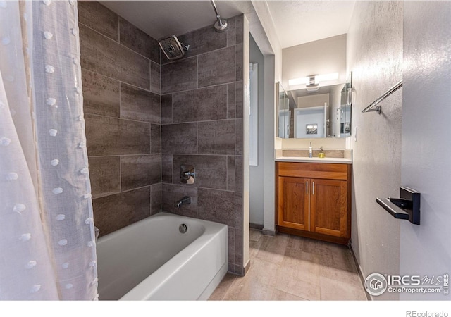 bathroom with vanity and shower / bath combination with curtain