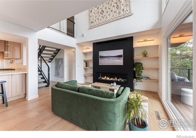 living room featuring light wood-type flooring