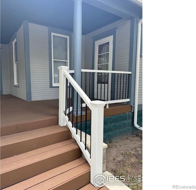 entrance to property with covered porch