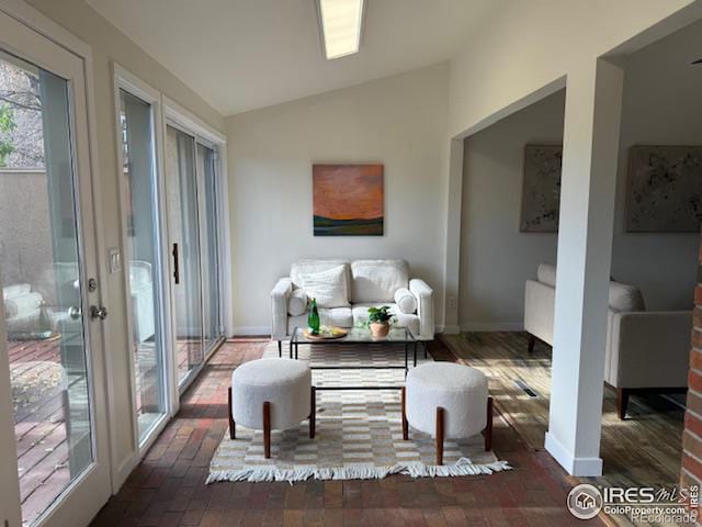 interior space featuring lofted ceiling