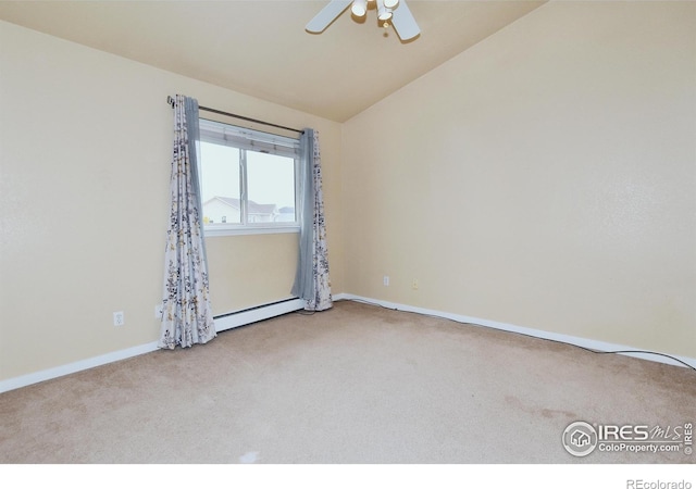 carpeted spare room with vaulted ceiling, ceiling fan, and a baseboard radiator