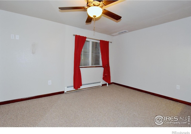 carpeted empty room with ceiling fan and baseboard heating