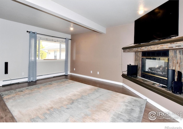 unfurnished living room featuring a baseboard heating unit, beamed ceiling, dark hardwood / wood-style floors, and a multi sided fireplace