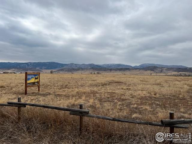 property view of mountains with a rural view